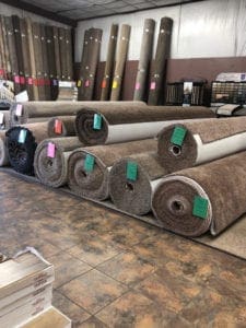 Carpet rolls stacked in the showroom